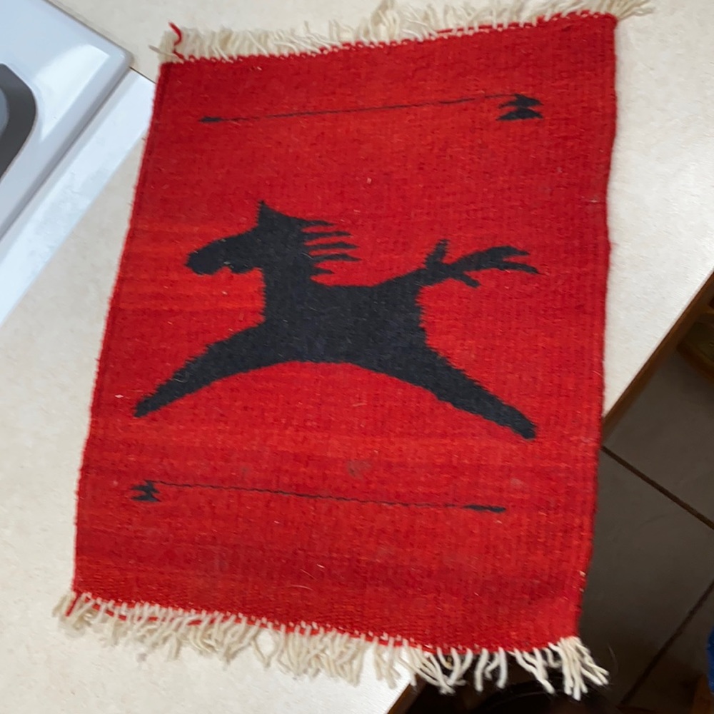 Woven rug or wall hanging. 12” wide by 15.5 tall. Native horse.